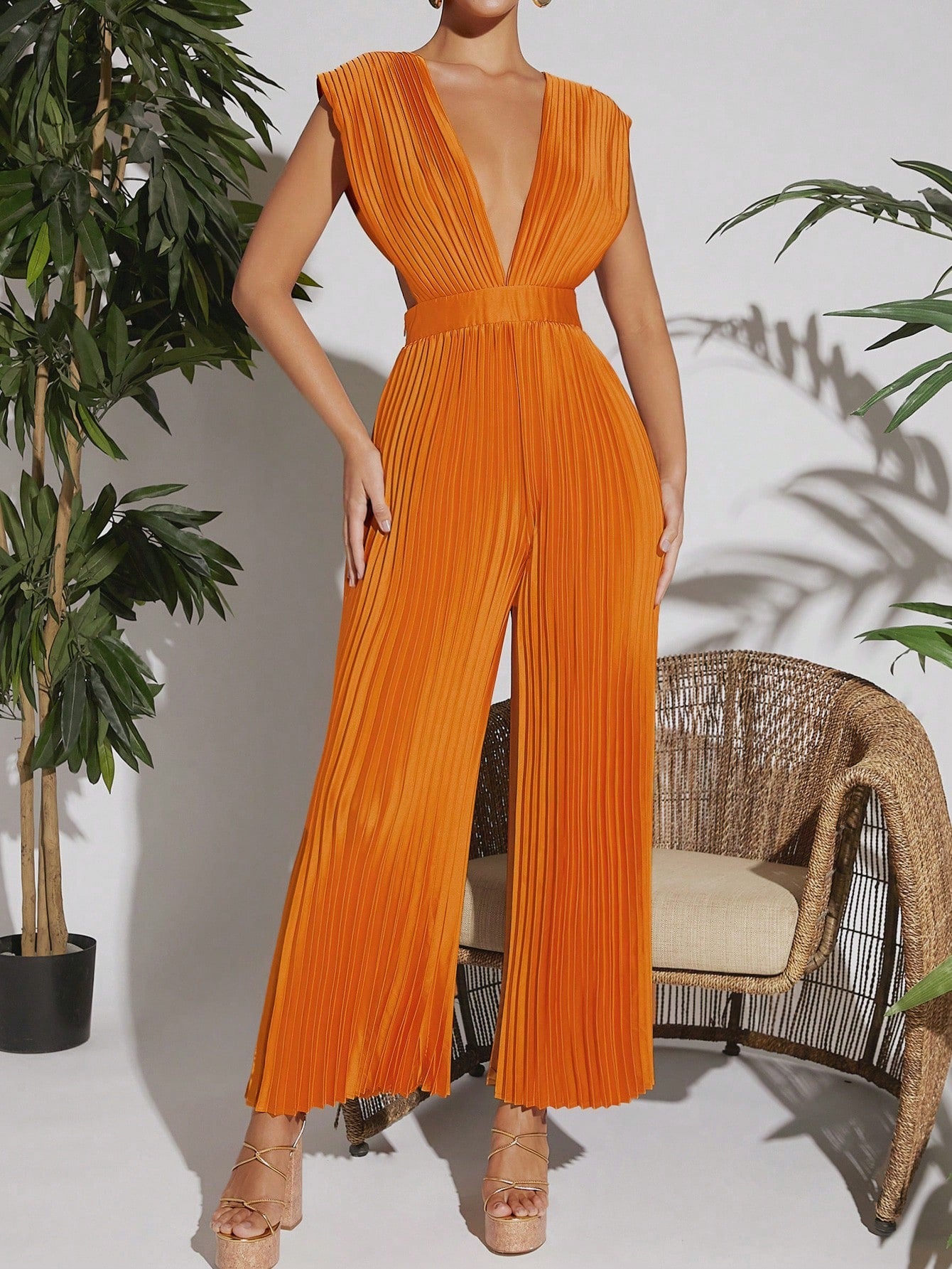 Jumpsuit naranja plisado
