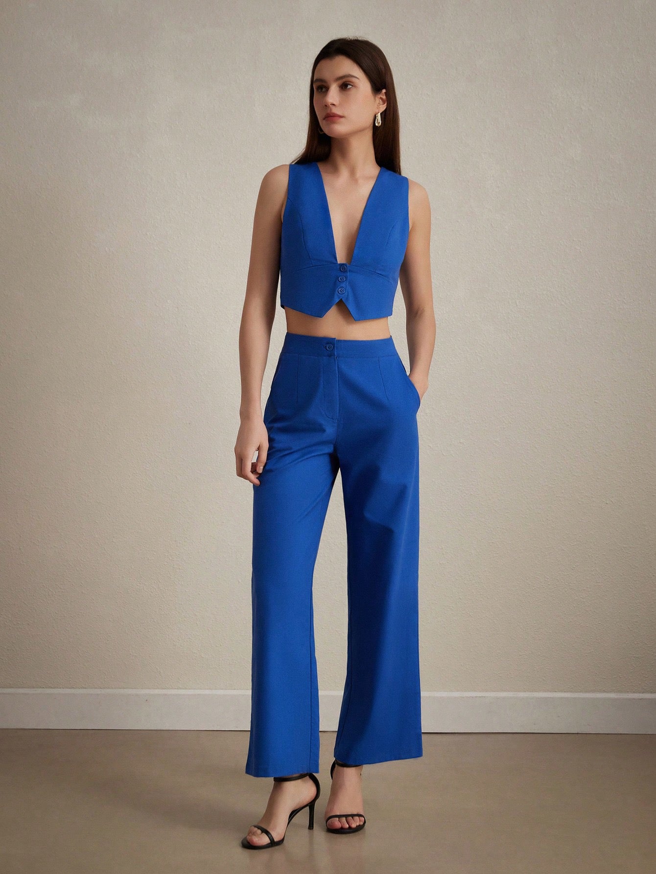 Conjunto de chaleco y pantalón