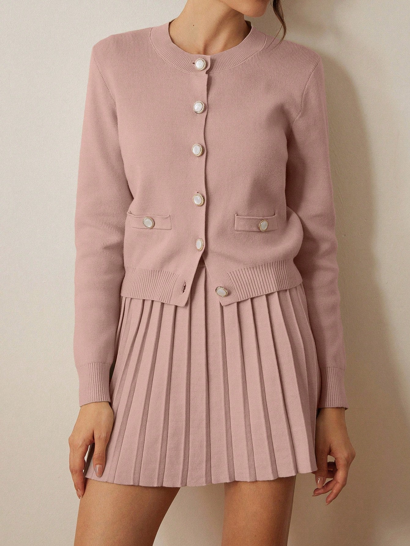 Set de cardigan y falda