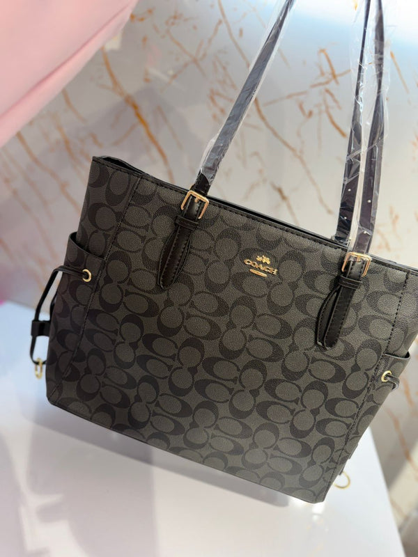 Cartera estilo tote Coach