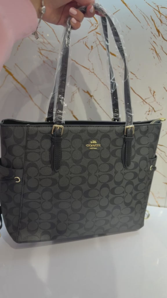Cartera estilo tote Coach